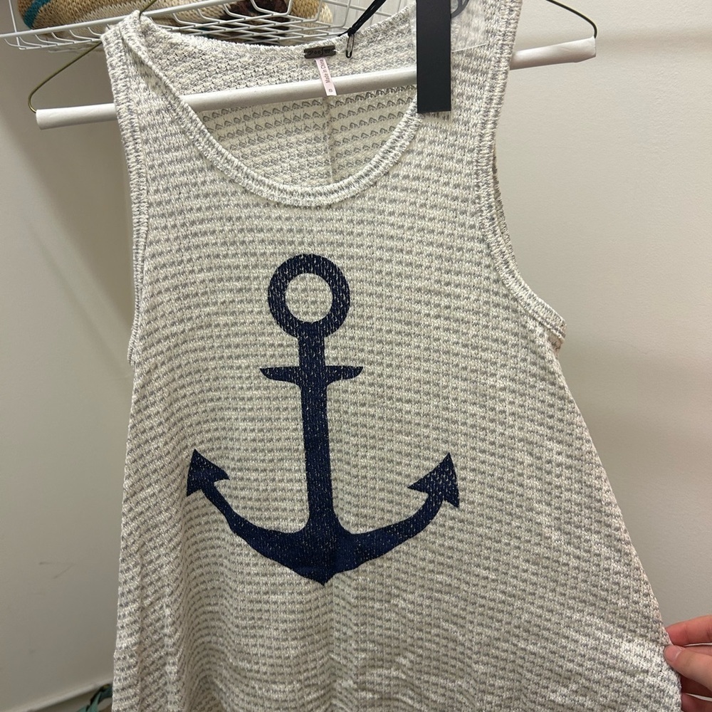 Poofw cotton and rayon tank shirt with blue anchor on front.